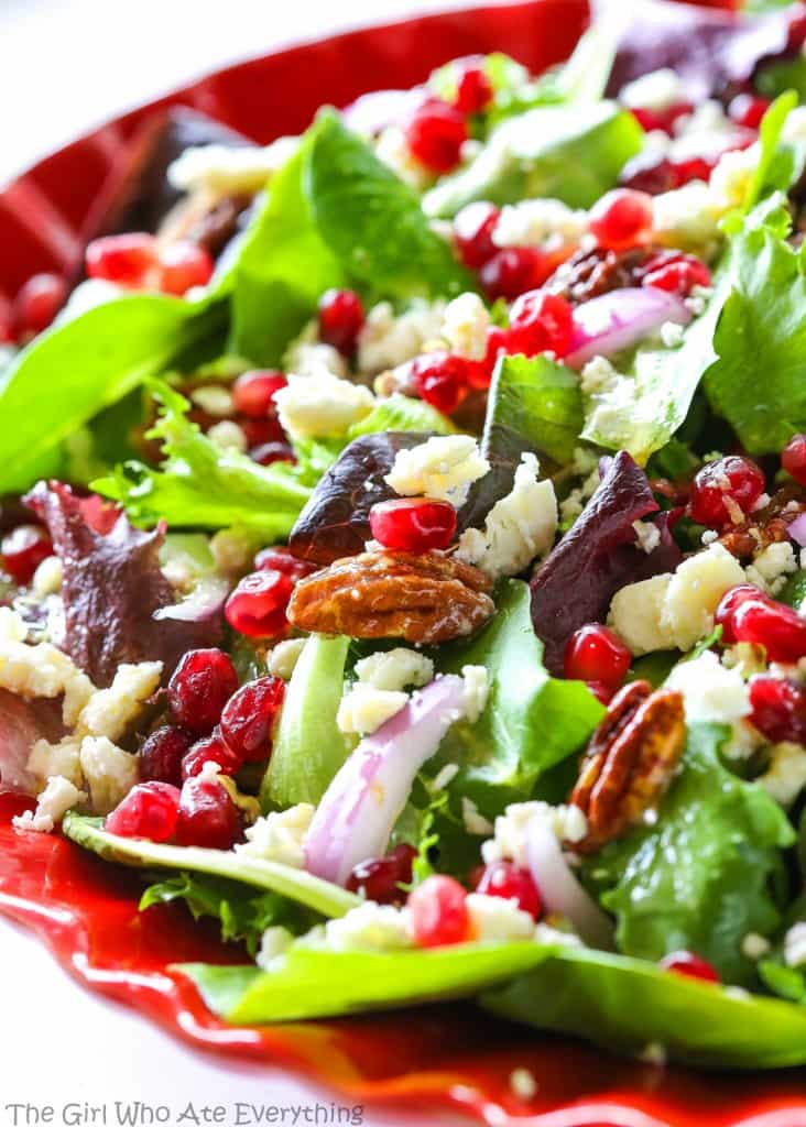 Pomegranate Feta Salad - this quick and easy salad is topped with a zesty vinaigrette! the-girl-who-ate-everything.com