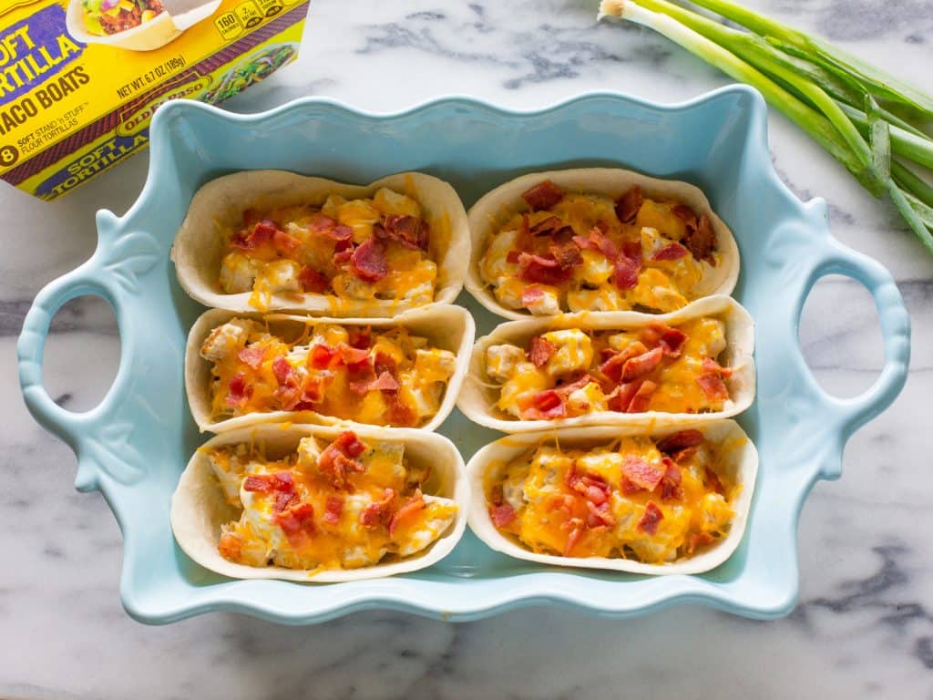 Chicken Ranch Bacon Taco Boats - everyone in the family will love these tacos for dinner! the-girl-who-ate-everything.com