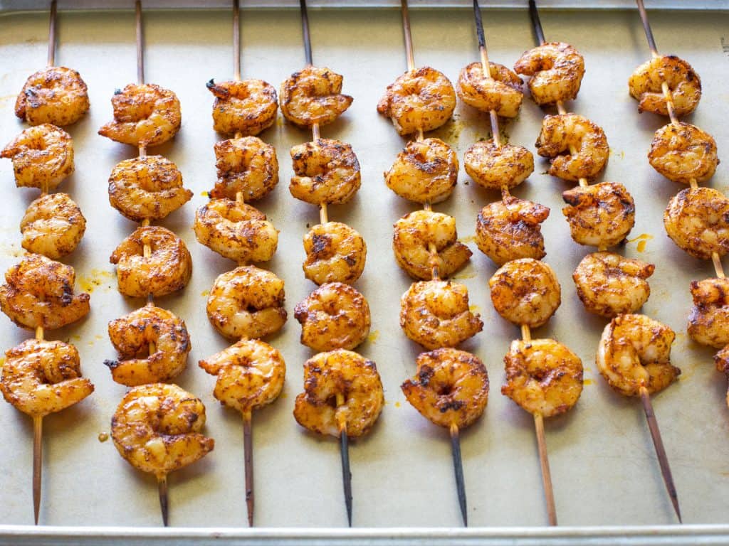 These Grilled Shrimp Tacos with Avocado Salsa are light and refreshing! the-girl-who-ate-everything.com