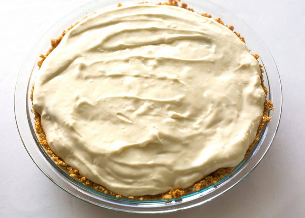 Caramel Apple Cheesecake - the easiest cheesecake with a graham cracker crust, apples, caramel, and nuts. the-girl-who-ate-everything.com