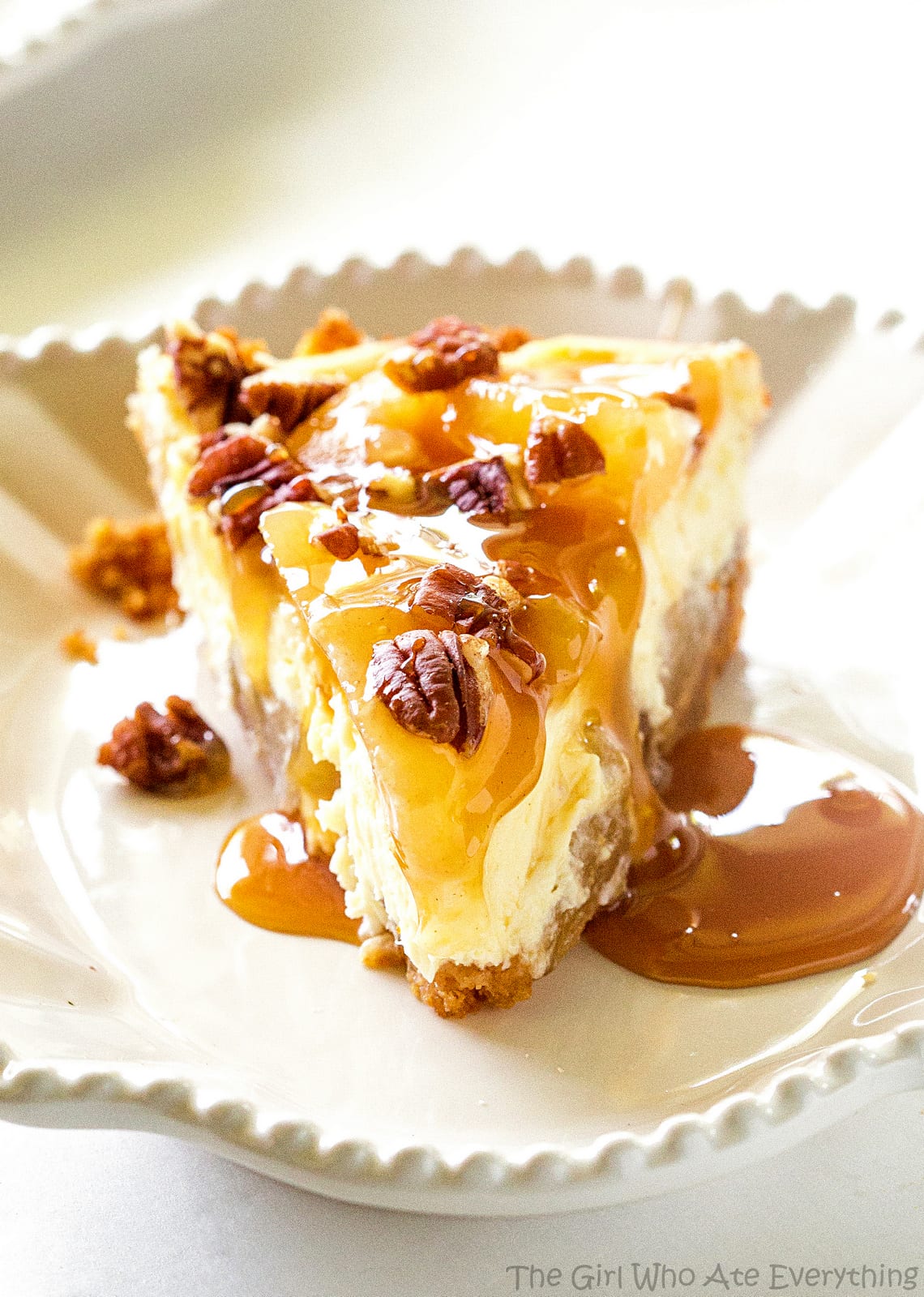 Caramel Apple Cheesecake - the easiest cheesecake with a graham cracker crust, apples, caramel, and nuts. the-girl-who-ate-everything.com
