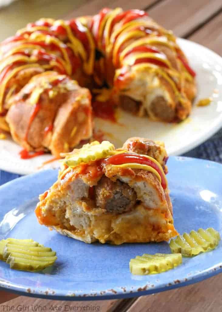 Bacon Cheeseburger Monkey Bread - layers of cheese, bacon, meatballs, and dough. the-girl-who-ate-everything.com