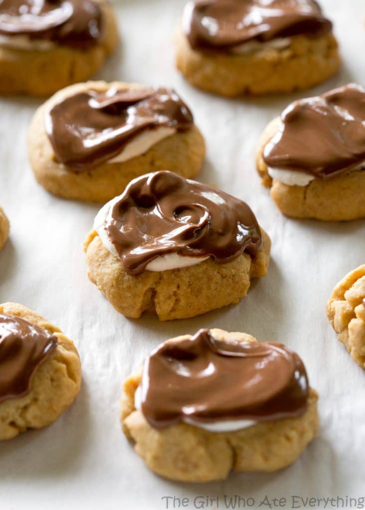 S'mores Thumbprints - a small graham cracker cookie topped with marshmallows and chocolate. the-girl-who-ate-everything.com
