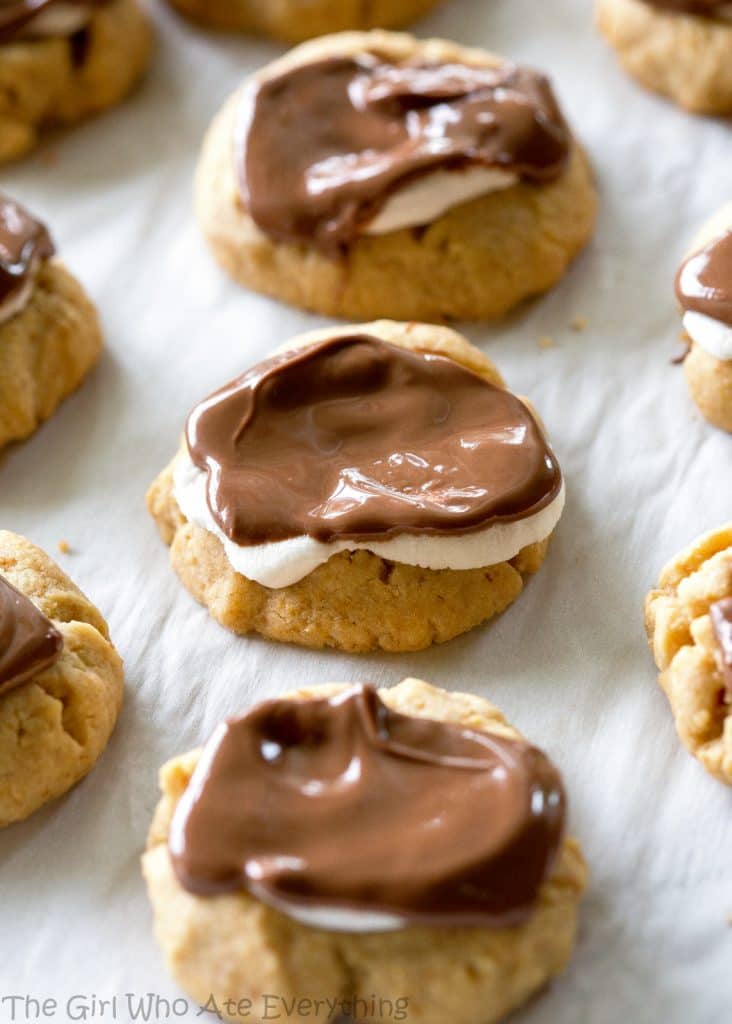 S'mores Thumbprints - a small graham cracker cookie topped with marshmallows and chocolate. the-girl-who-ate-everything.com