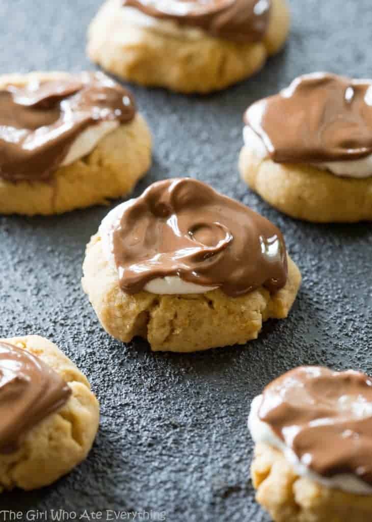 S'mores Thumbprints - a small graham cracker cookie topped with marshmallows and chocolate. the-girl-who-ate-everything.com