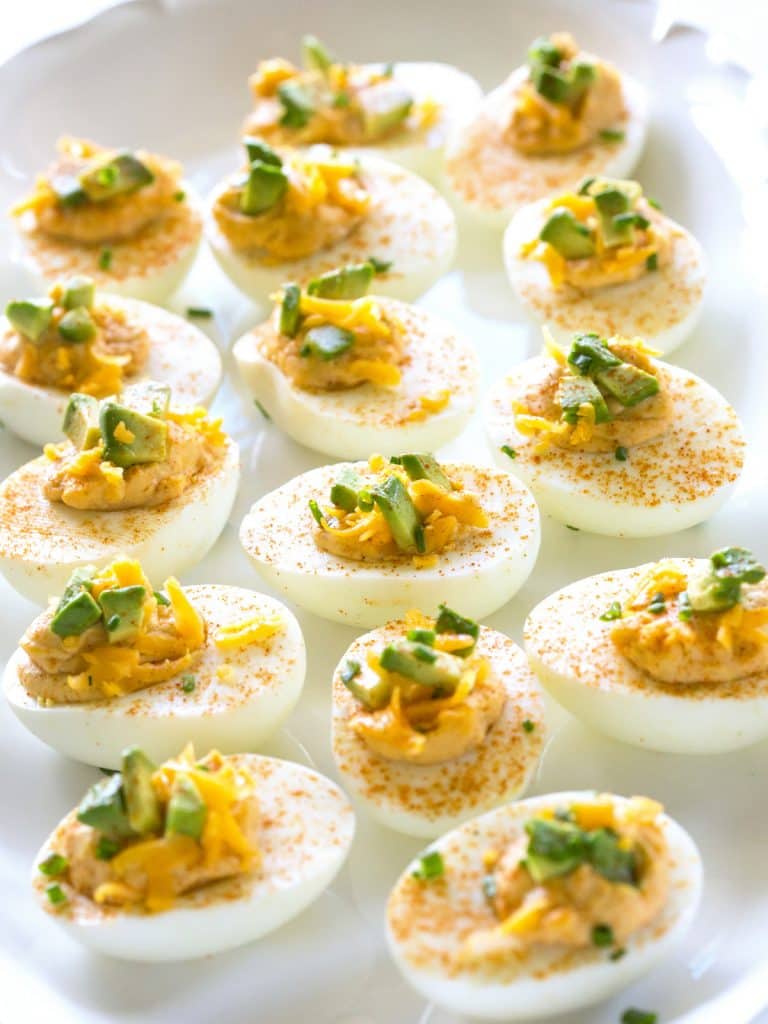 These Mexican Deviled Eggs are a spicy twist on your classic deviled eggs. the-girl-who-ate-everything.com