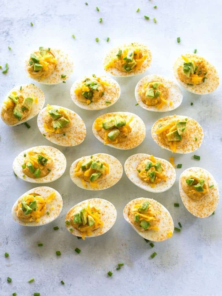 These Mexican Deviled Eggs are a spicy twist on your classic deviled eggs. the-girl-who-ate-everything.com