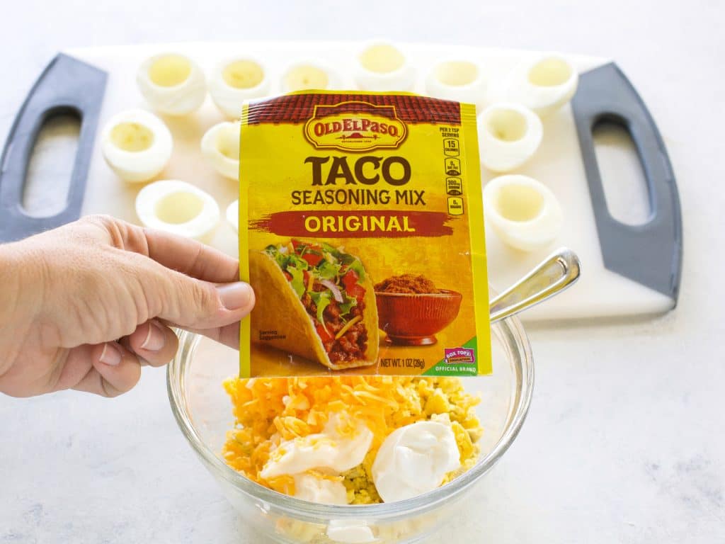 These Mexican Deviled Eggs are a spicy twist on your classic deviled eggs. the-girl-who-ate-everything.com