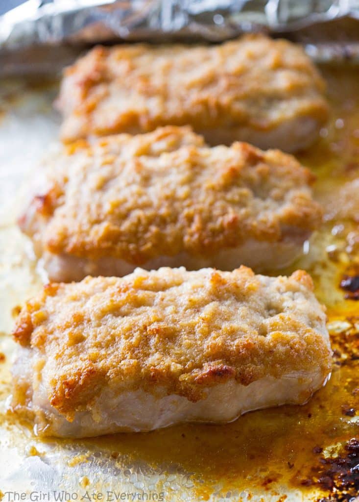 Horseradish Crusted Pork Chops - pork chops topped with a tangy, buttery, breadcrumb topping. the-girl-who-ate-everything.com