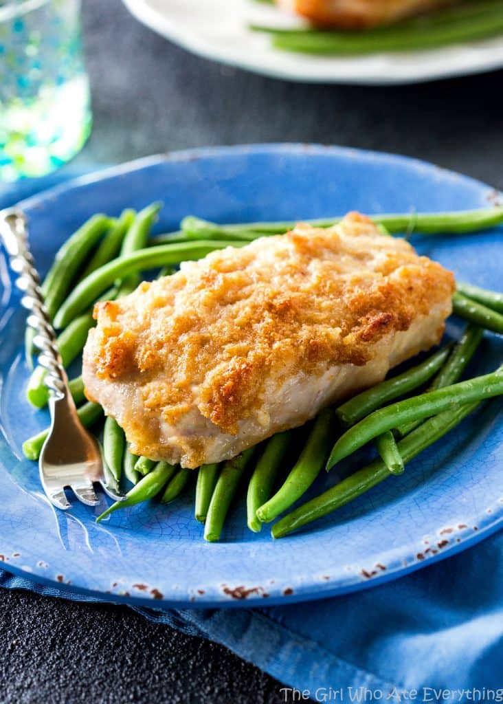 Horseradish Crusted Pork Chops - pork chops topped with a tangy, buttery, breadcrumb topping. the-girl-who-ate-everything.com