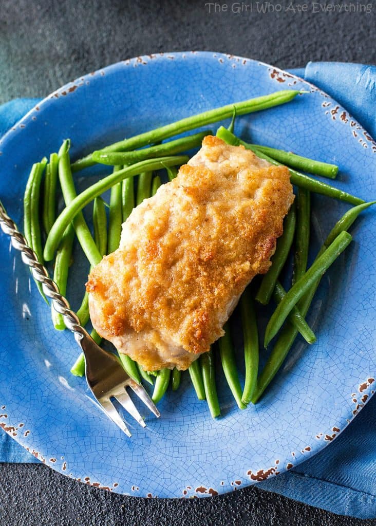Horseradish Crusted Pork Chops - pork chops topped with a tangy, buttery, breadcrumb topping. the-girl-who-ate-everything.com