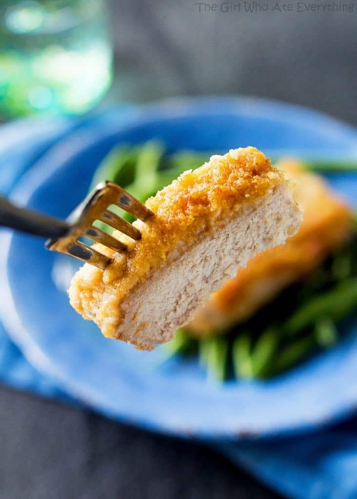 Horseradish Crusted Pork Chops - pork chops topped with a tangy, buttery, breadcrumb topping. the-girl-who-ate-everything.com