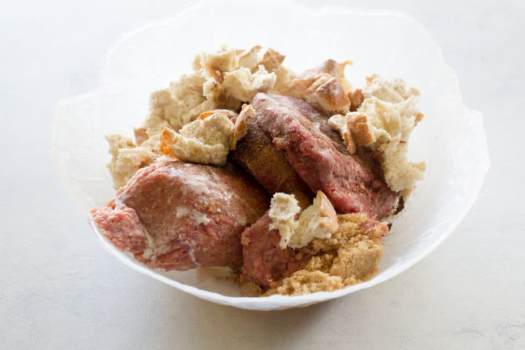 Swedish Meatballs - so tender with a flavorful gravy. Serve over noodles or rice. the-girl-who-ate-everything.com