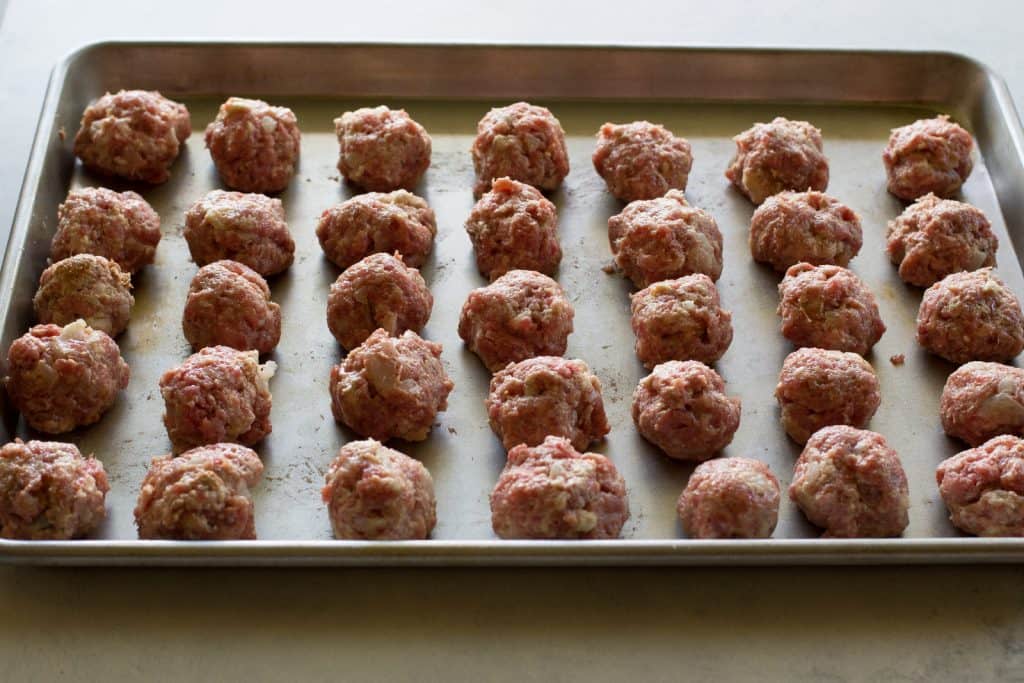 Swedish Meatballs - so tender with a flavorful gravy. Serve over noodles or rice. the-girl-who-ate-everything.com