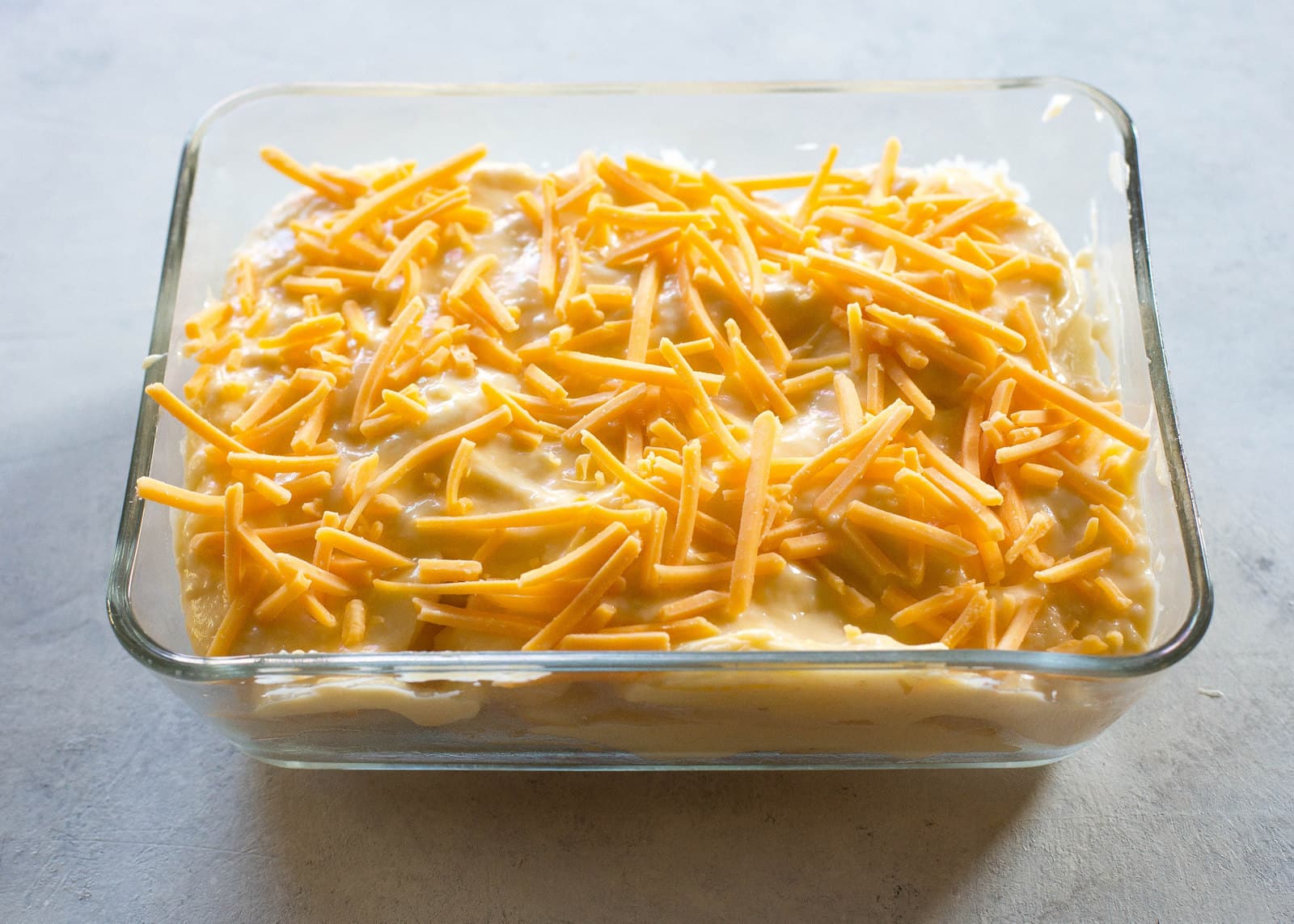 scalloped potatoes with cheese on top