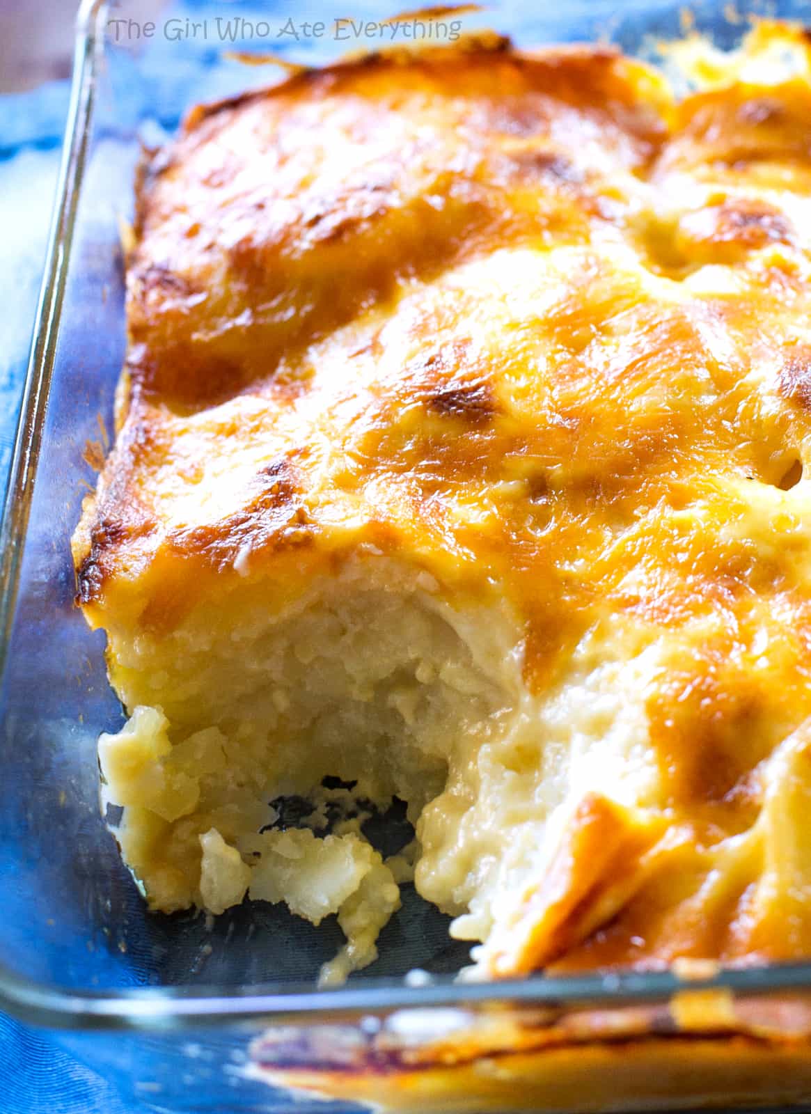 Scalloped Potatoes with a scoop taken out