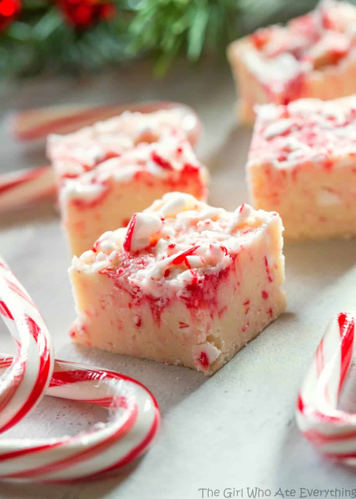 Candy Cane Fudge - only 5 ingredients and so delicious. the-girl-who-ate-everything.com