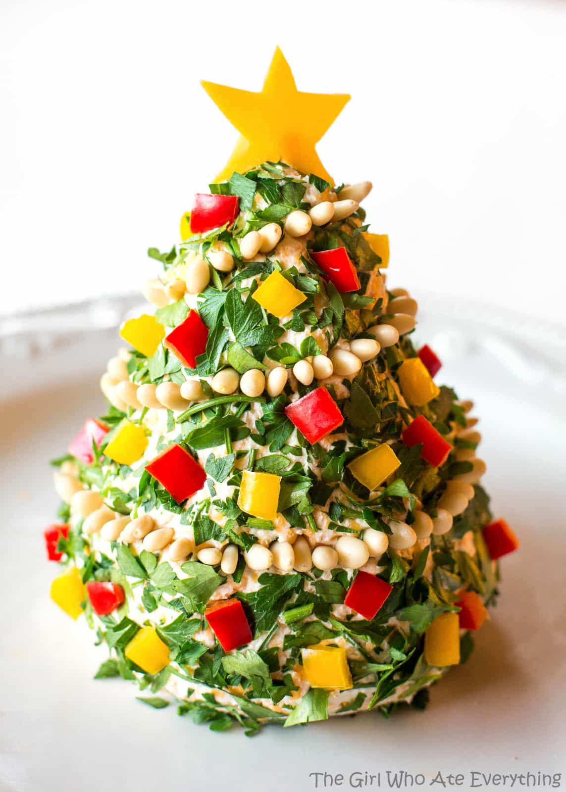 Christmas Cheese Tree - super simple yet impressive cheese ball shaped in a tree! the-girl-who-ate-everything.com