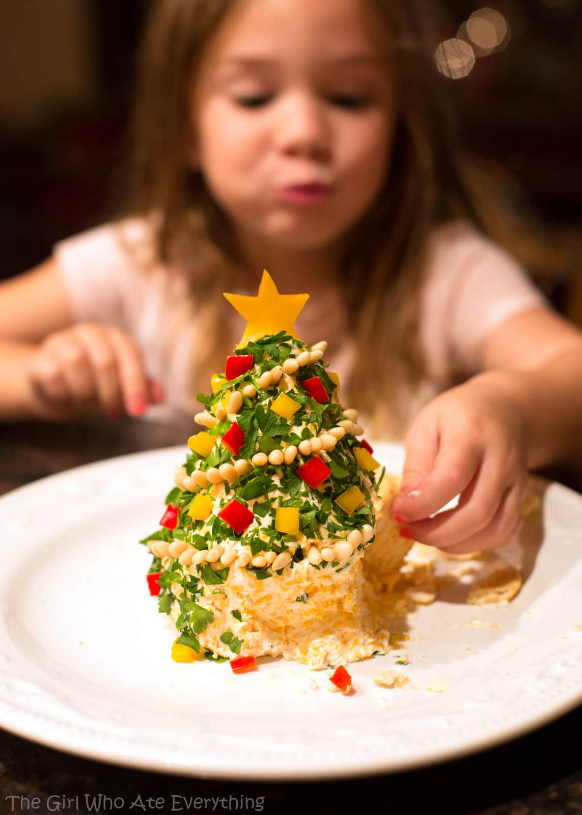 Christmas Cheese Tree - super simple yet impressive cheese ball shaped in a tree! the-girl-who-ate-everything.com