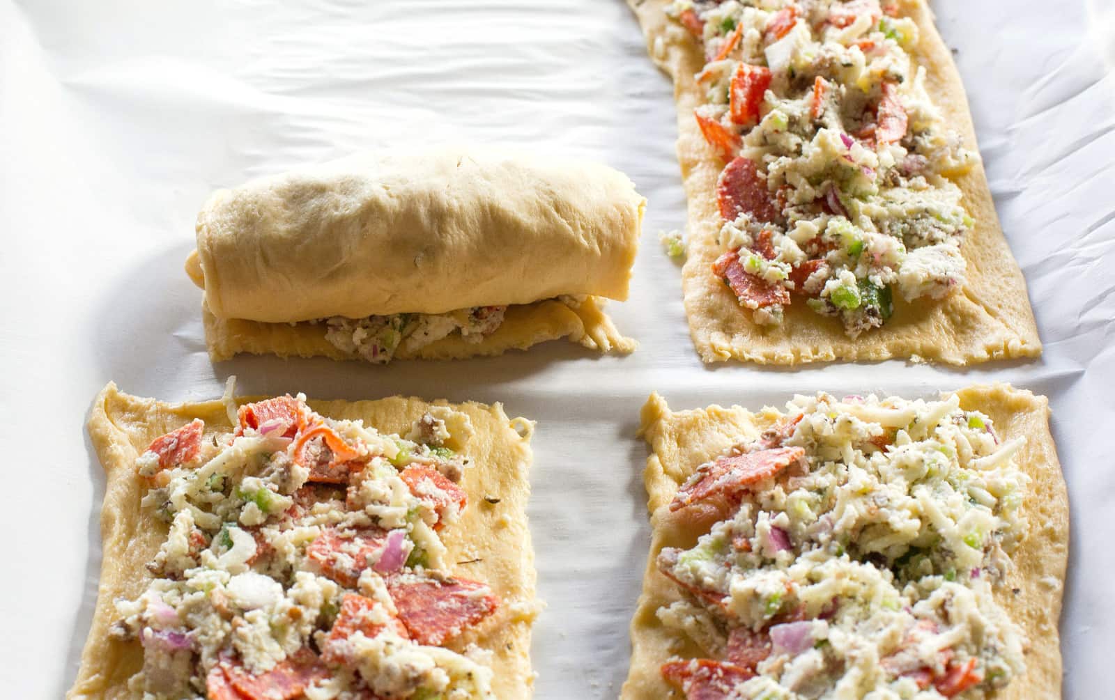 Calzone Pinwheels - pepperoni, mushrooms, onion, and green bell pepper. Guess we should call these Supreme Calzone Pinwheels! the-girl-who-ate-everything.com