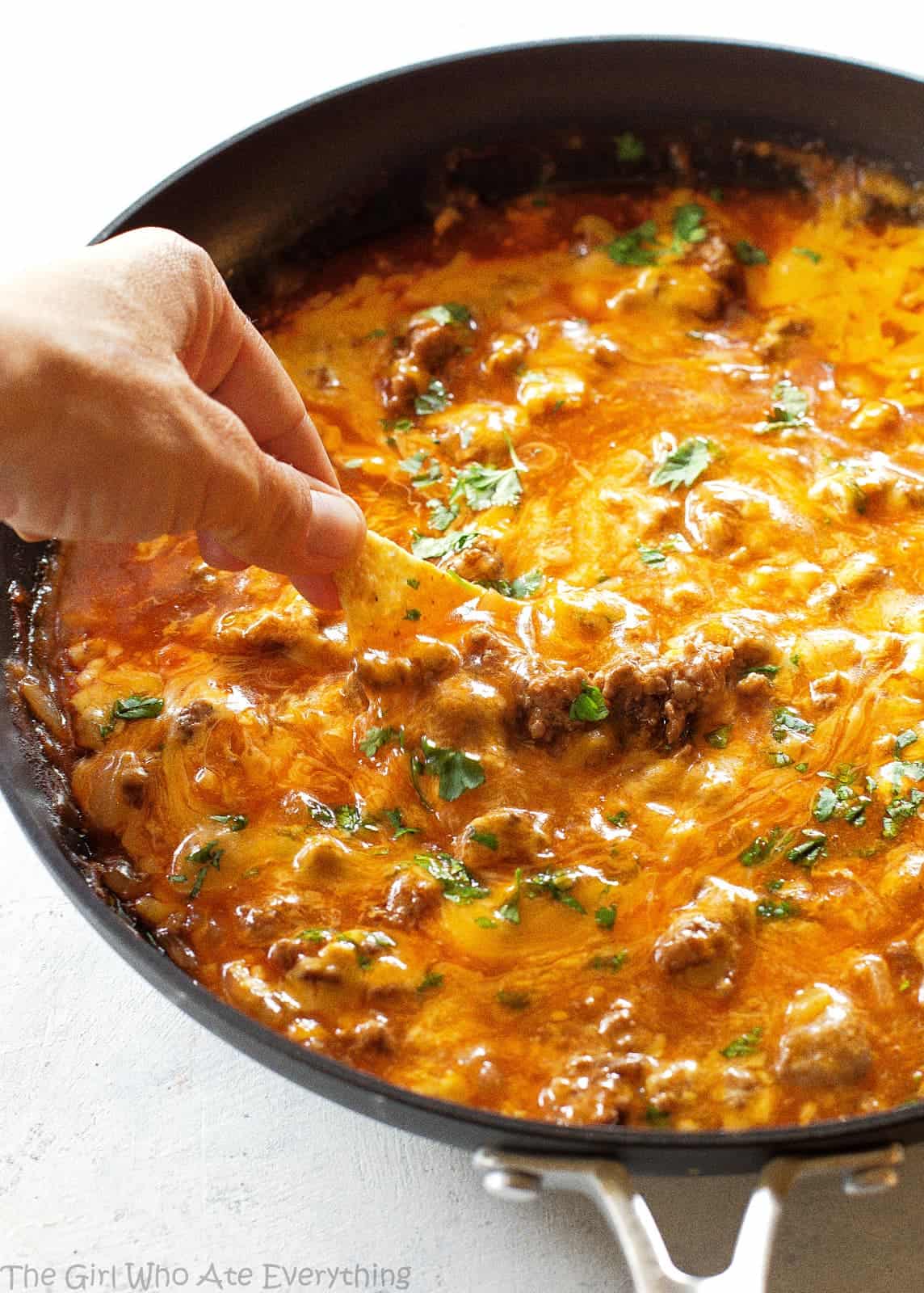 Beef Enchilada Dip - so easy! Always a crowd pleaser! the-girl-who-ate-everything.com