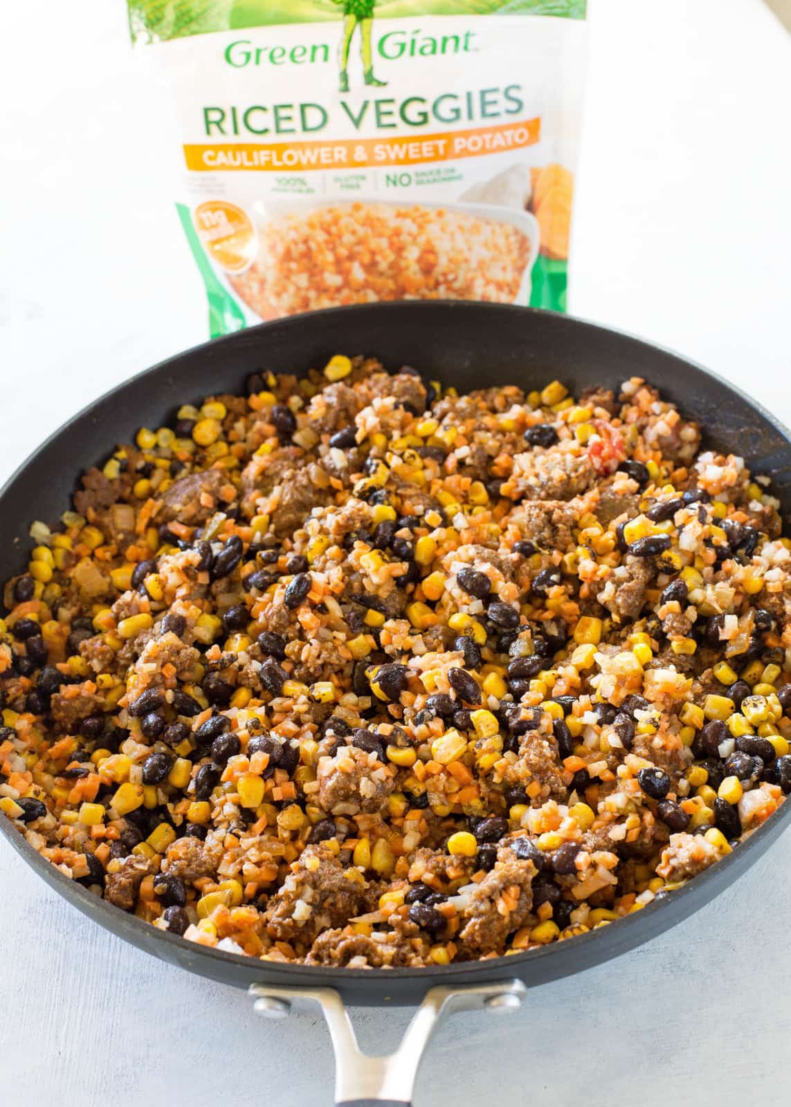 Riced Cauliflower and Sweet Potato Beef Burrito Bowls - a healthy version of your favorite burrito bowl! the-girl-who-ate-everything.com