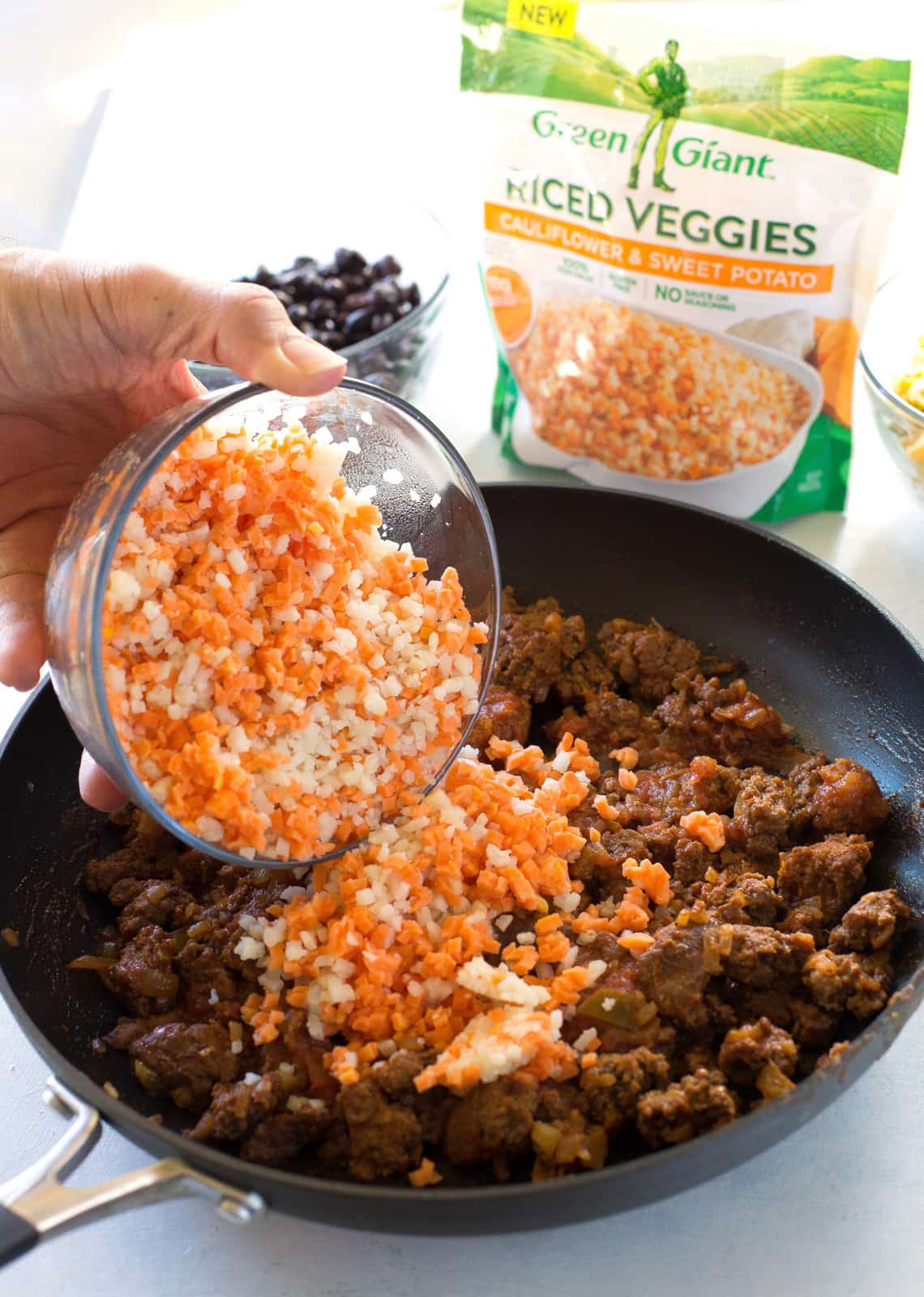 Riced Cauliflower and Sweet Potato Beef Burrito Bowls - a healthy version of your favorite burrito bowl! the-girl-who-ate-everything.com