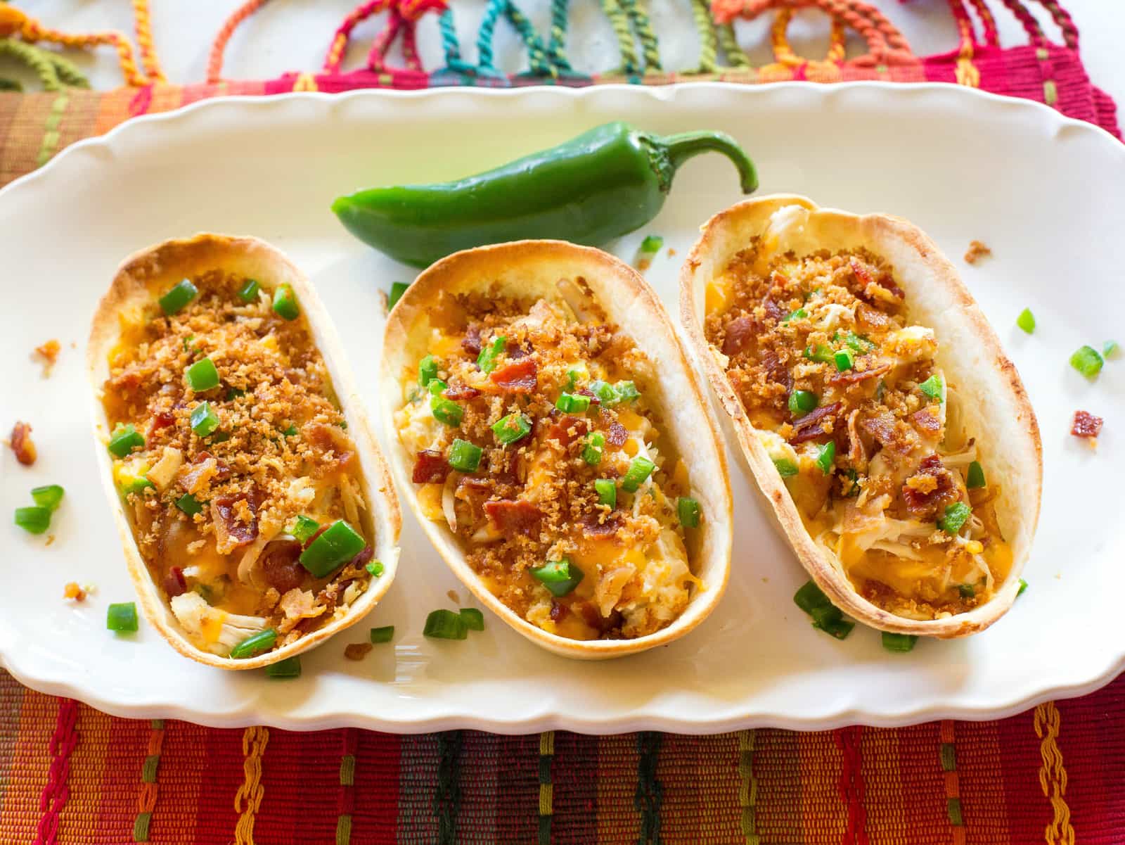 Jalapeno Popper Chicken Tacos - so good! Creamy, a little spicy, and with crunchy Panko topping on top! the-girl-who-ate-everything.com