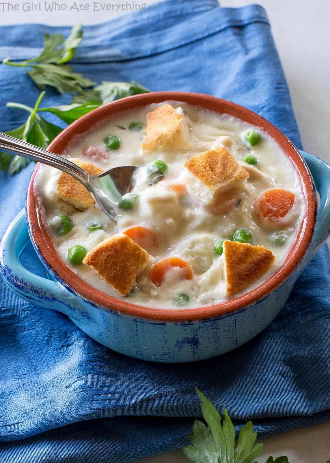 Chicken Pot Pie Soup - creamy pot pie soup with carrots, peas and potatoes. Seasoned to perfection! the-girl-who-ate-everything.com