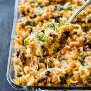 Fiesta Chicken Pasta Bake - creamy, spicy, cheesy...your family will love this easy Mexican dinner. the-girl-who-ate-everything.com