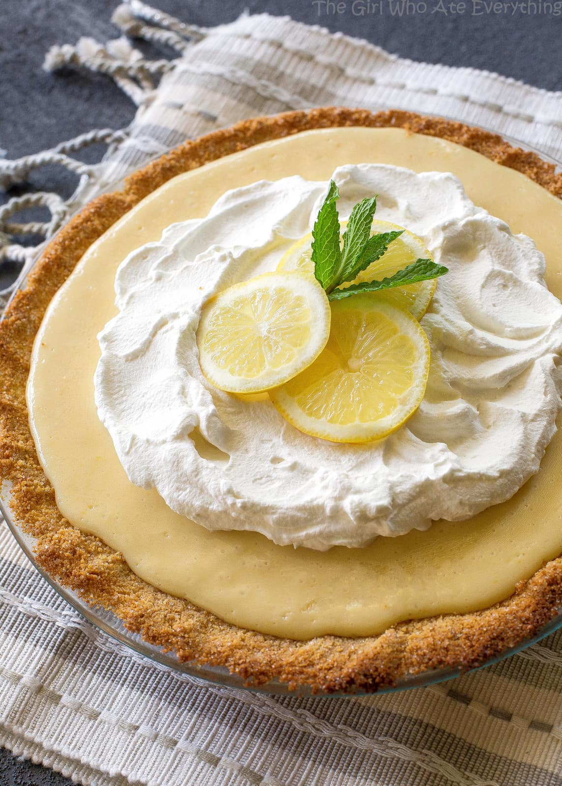 Magnolia's Lemon Pie - light, sweet and tart lemon pie with a thick graham cracker crust. From Joanna Gaines! the-girl-who-ate-everything.com