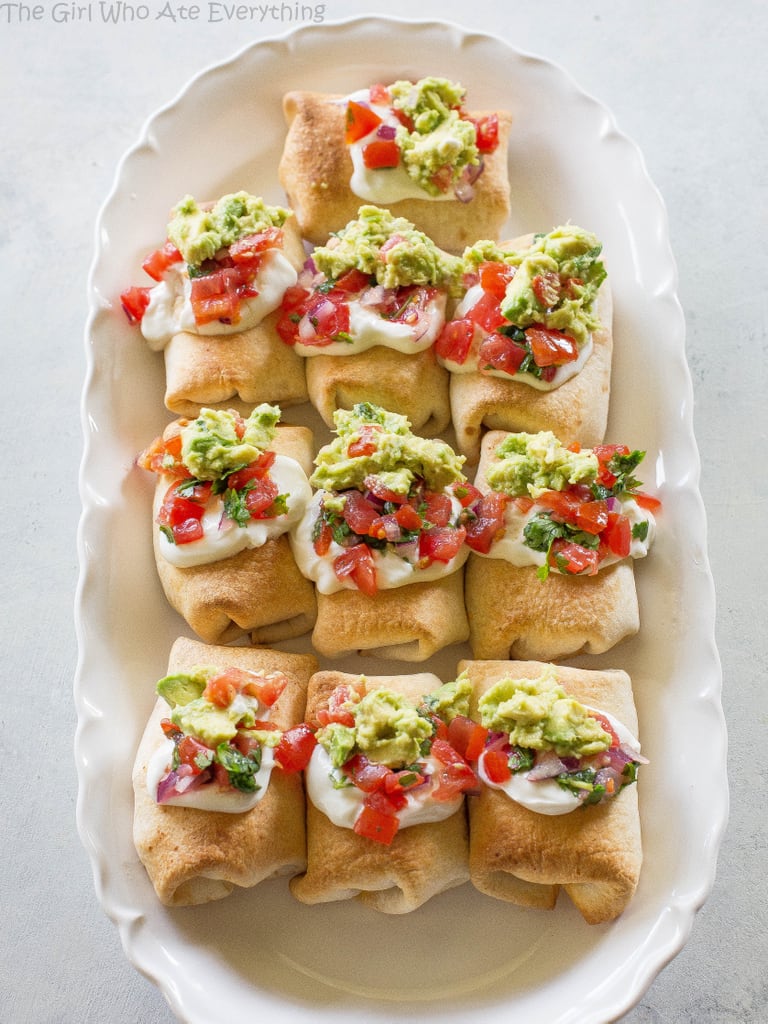 Mini Chicken Chimichangas - these mini Mexican appetizers are filled with creamy chicken and spicy Pepper Jack cheese. the-girl-who-ate-everything.com 