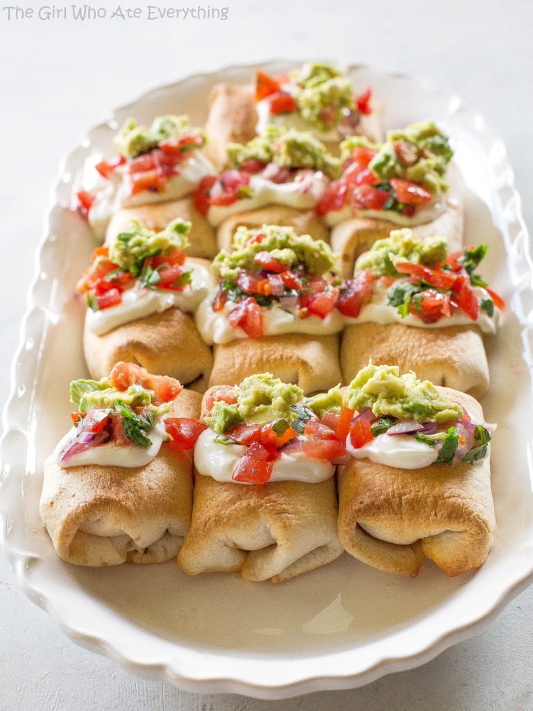 Mini Chicken Chimichangas - these mini Mexican appetizers are filled with creamy chicken and spicy Pepper Jack cheese. the-girl-who-ate-everything.com 