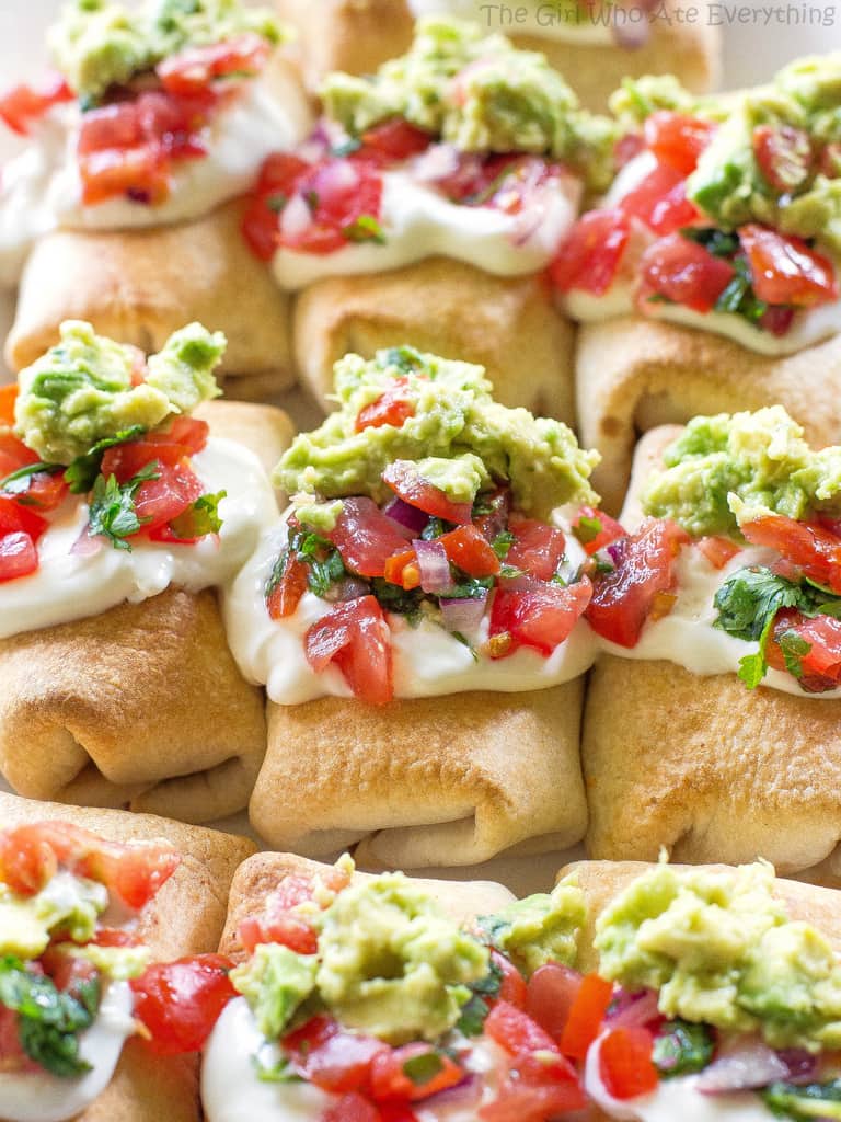 Mini Chicken Chimichangas - these mini Mexican appetizers are filled with creamy chicken and spicy Pepper Jack cheese. the-girl-who-ate-everything.com 
