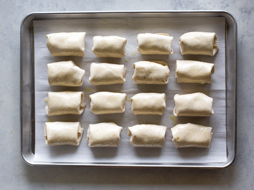 Mini Chicken Chimichangas - these mini Mexican appetizers are filled with creamy chicken and spicy Pepper Jack cheese. the-girl-who-ate-everything.com 