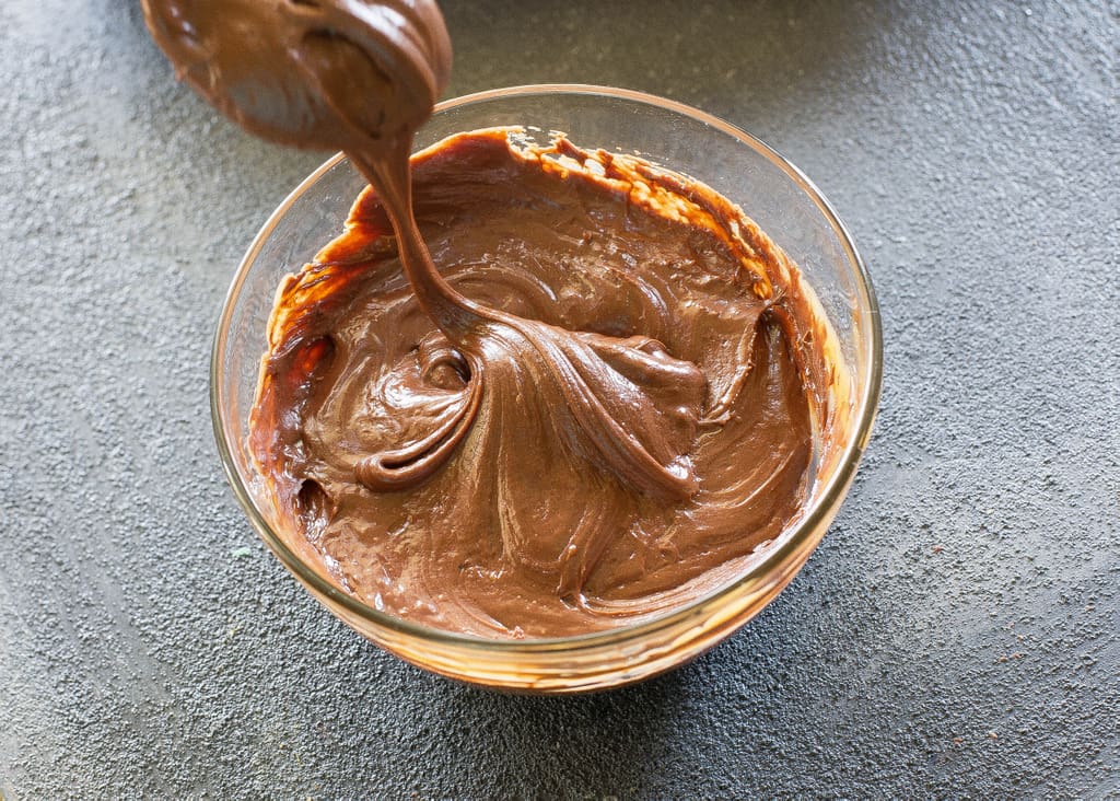 Turtle Buckeye Brownies - rich chocolate brownies, a peanut butter truffle layer and topped with a caramel chocolate pecan layer. The ultimate decadent dessert. the-girl-who-ate-everything.com