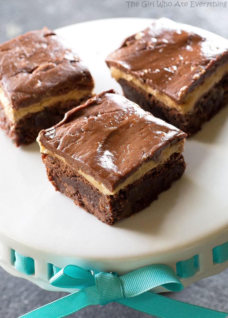 Turtle Buckeye Brownies - rich chocolate brownies, a peanut butter truffle layer, topped with a caramel chocolate pecan layer. The ultimate decadent dessert. the-girl-who-ate-everything.com