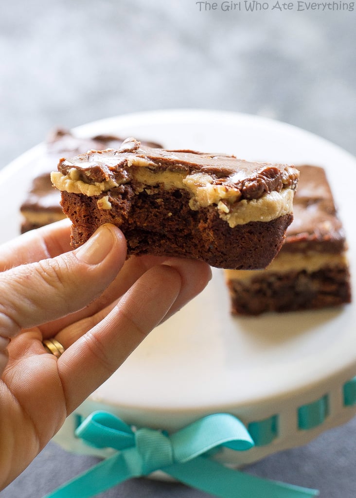 Turtle Buckeye Brownies - rich chocolate brownies, a peanut butter truffle layer, topped with a caramel chocolate pecan layer. The ultimate decadent dessert. the-girl-who-ate-everything.com