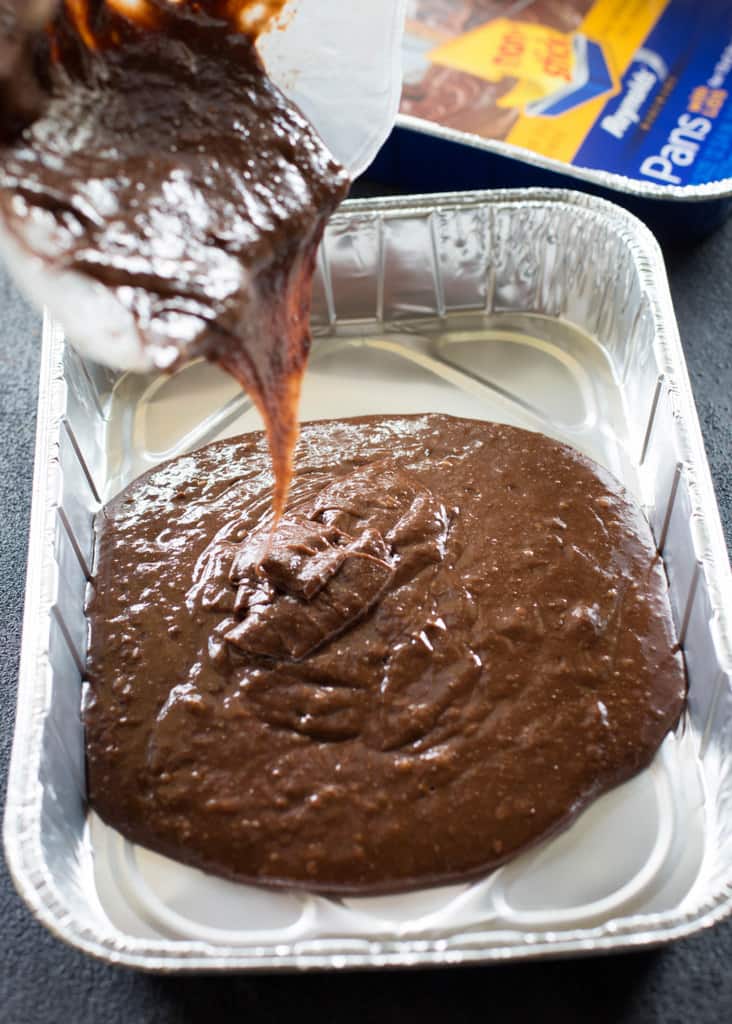 Turtle Buckeye Brownies - rich chocolate brownies, a peanut butter truffle layer and topped with a caramel chocolate pecan layer. The ultimate decadent dessert. the-girl-who-ate-everything.com