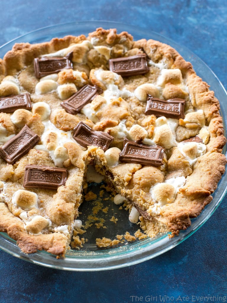 Easy S'mores Pie - layers of graham cracker dough, marshmallows, and chocolate. the-girl-who-ate-everything.com