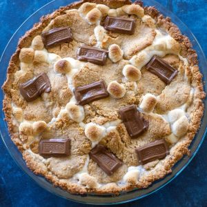 Easy S'mores Pie - layers of graham cracker dough, marshmallows, and chocolate. the-girl-who-ate-everything.com