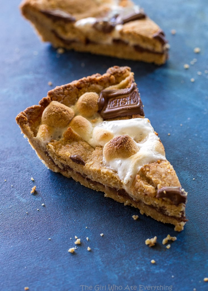 Easy S'mores Pie - layers of graham cracker dough, marshmallows, and chocolate. the-girl-who-ate-everything.com