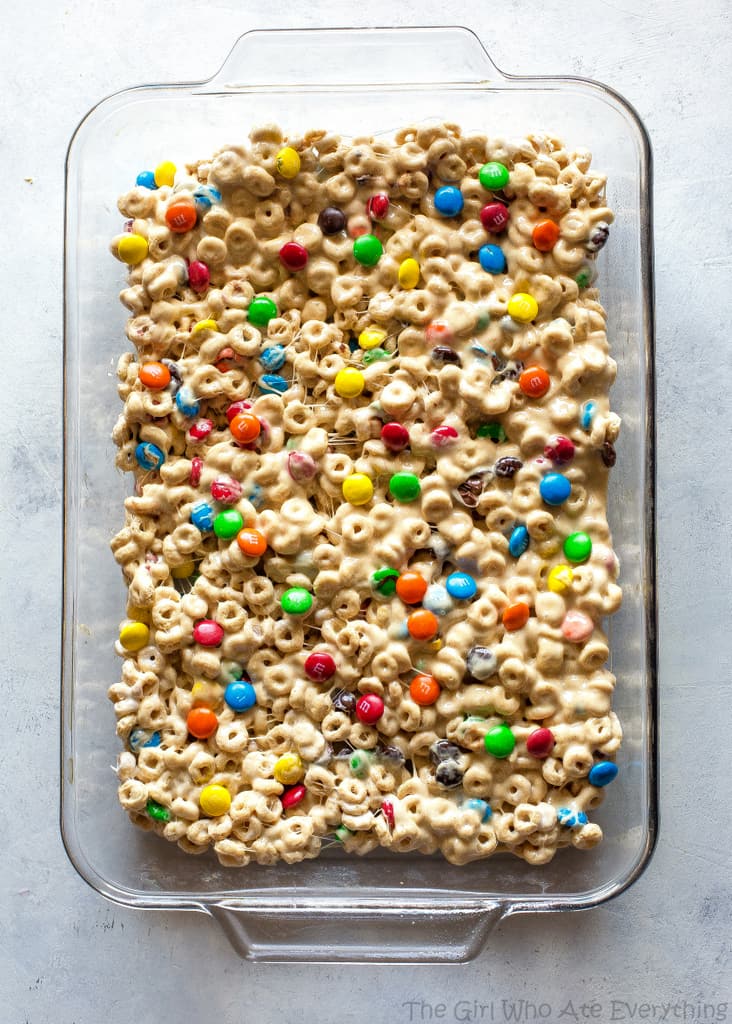 Cheerio Treats - an easy no-bake recipe with cheerios, marshmallows, peanut butter, and M&Ms. the-girl-who-ate-everything.com