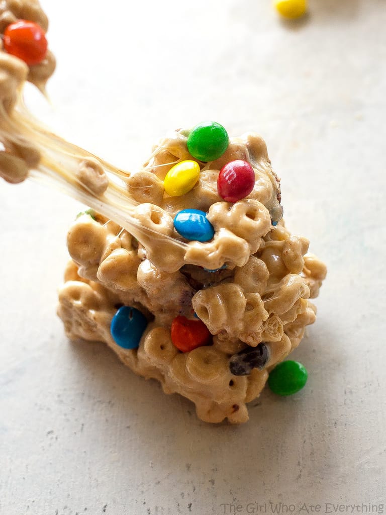 Cheerio Treats - an easy no-bake recipe with cheerios, marshmallows, peanut butter, and M&Ms. the-girl-who-ate-everything.com
