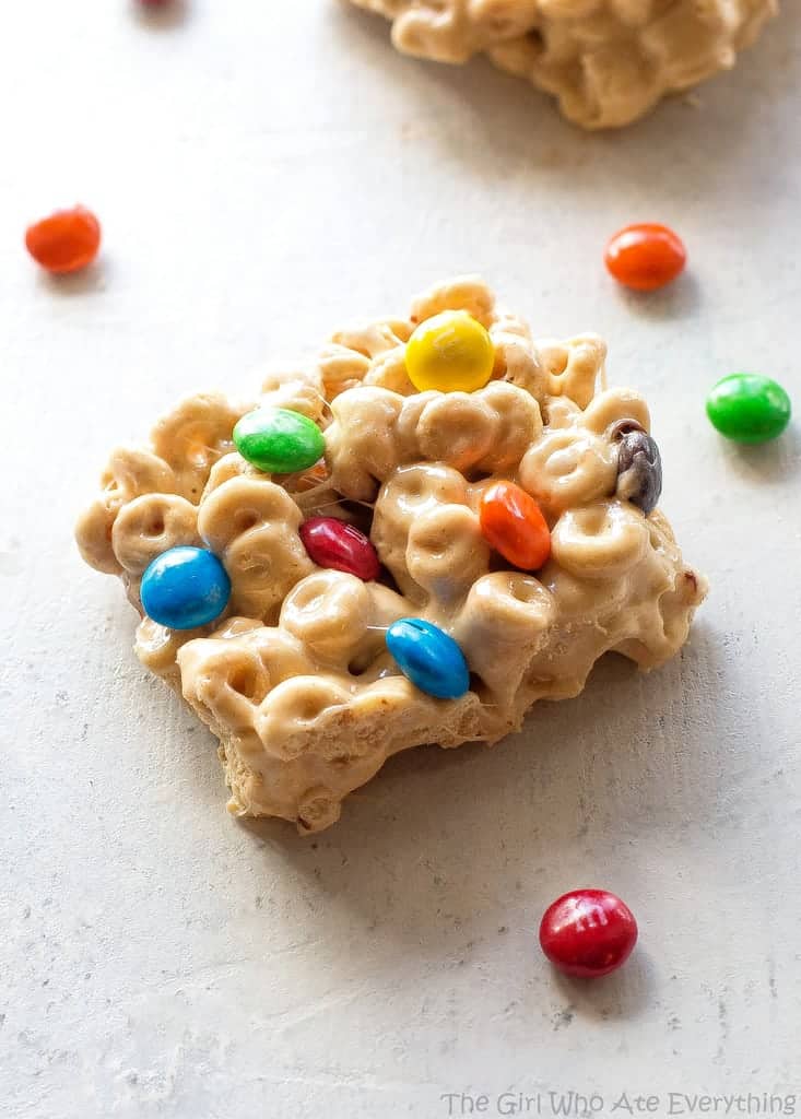 Cheerio Treats - an easy no-bake recipe with cheerios, marshmallows, peanut butter, and M&Ms. the-girl-who-ate-everything.com