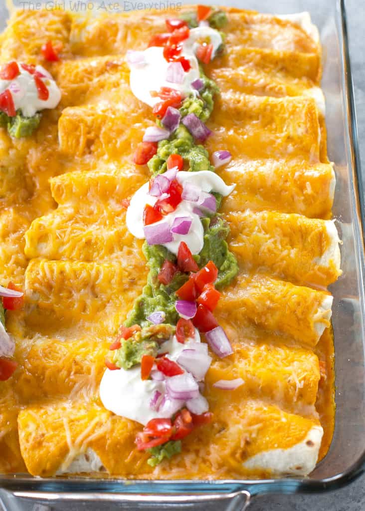 Sweet Potato and Black Bean Enchiladas - a vegetarian Mexican dinner that has the perfect amount of spice and flavor. This is a great freezer meal! the-girl-who-ate-everything.com