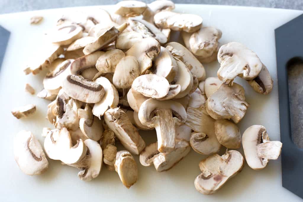 This homemade Green Bean Casserole recipe made without cream of mushroom soup. Easy and delicious side for Thanksgiving or any other holiday. the-girl-who-ate-everything.com
