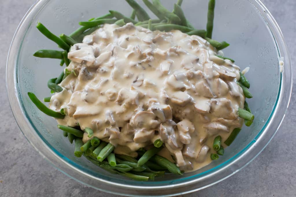 This homemade Green Bean Casserole recipe made without cream of mushroom soup. Easy and delicious side for Thanksgiving or any other holiday. the-girl-who-ate-everything.com