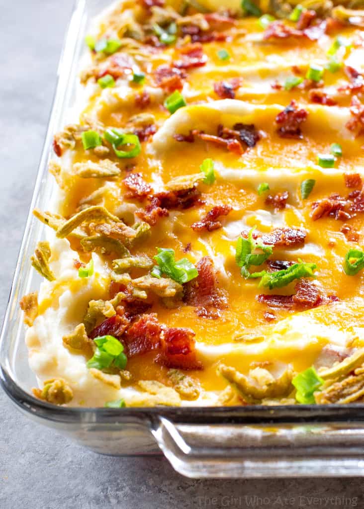 These Jalapeno Popper Mashed Potatoes are creamy mashed potatoes loaded with cheese, bacon, and crispy jalapenos. These will take your Thanksgiving (or Friendsgiving) to the next level. the-girl-who-ate-everything.com