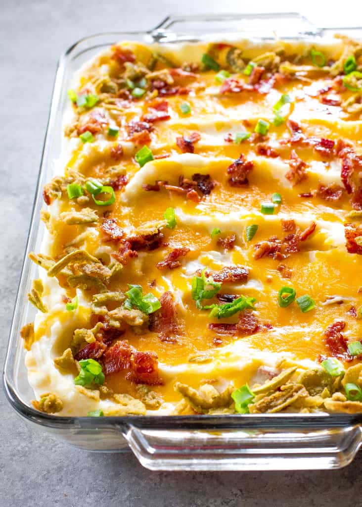 These Jalapeno Popper Mashed Potatoes are creamy mashed potatoes loaded with cheese, bacon, and crispy jalapenos. These will take your Thanksgiving (or Friendsgiving) to the next level. the-girl-who-ate-everything.com